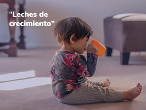 bebe-en-el-piso-tomando-leche