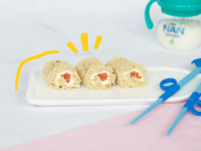 platos con rollitos de salmón para bebé vaso entrenador con leche nan platos con rollitos de salmón para bebé vaso entrenador con leche nan
